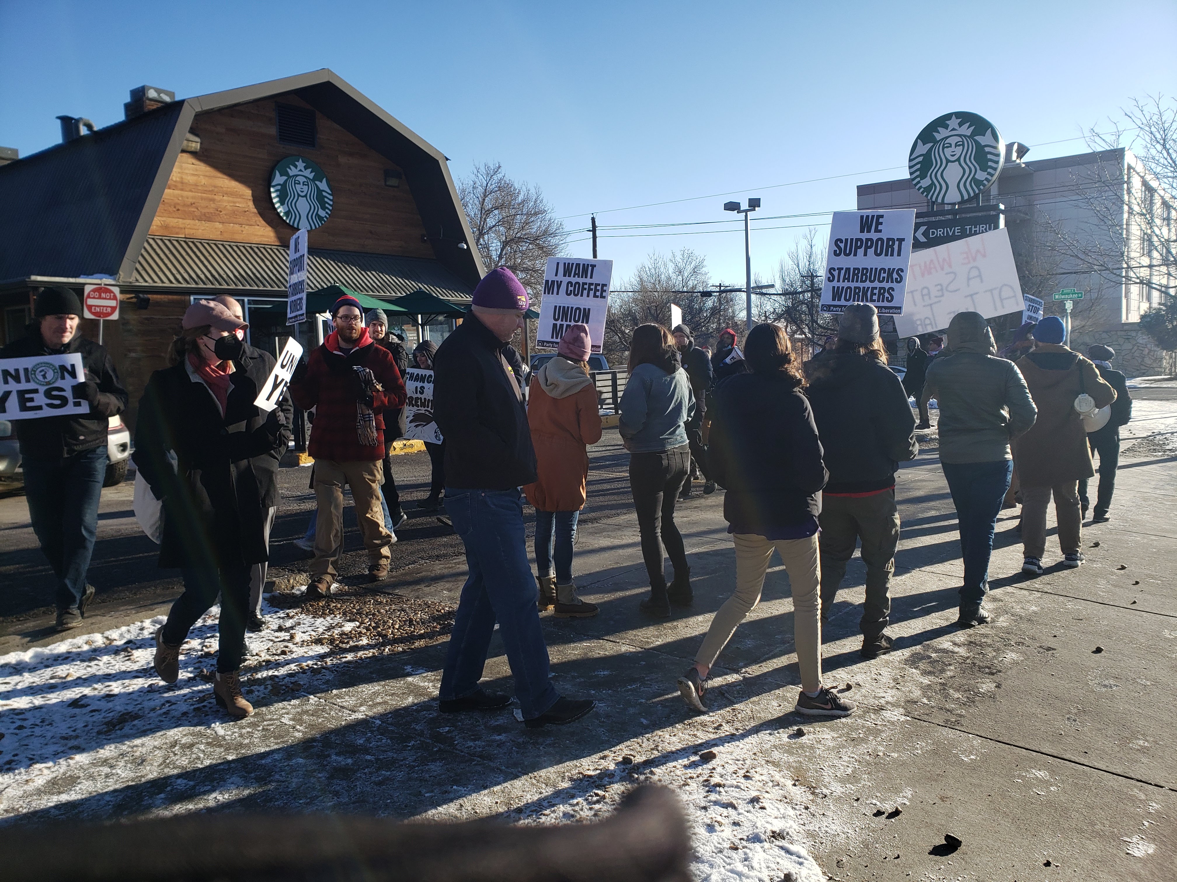 Denver DSA members picketing at a Starbucks